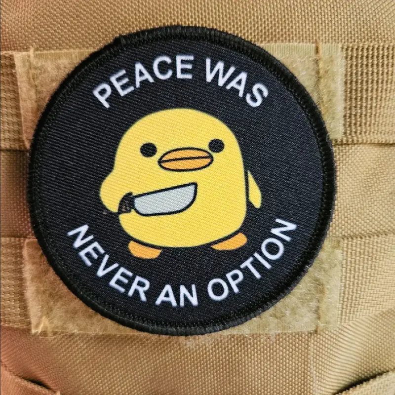 Peace was never an option cute duckling meme 3 circle removable morale patch with hook and loop backing