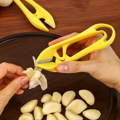 Stainless Steel Garlic Peeler with Dual Blades Quick Peel Manual Garlic Skin Remover Tool Ergonomic Easy Clean Kitchen Gadget...