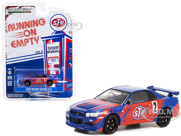 2002 Nissan Skyline GT-R (R34) 2 Blue with Red Graphics \