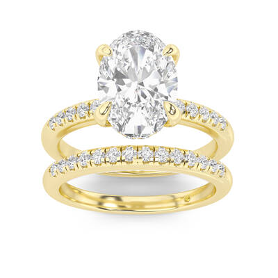 Aurelia Lab Grown Oval Shaped Diamond Engagement Ring with the BonBon Quarter Coverage Wedding Band | 18K Yellow Gold 2 ct. t...