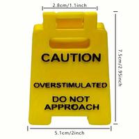 Caution Overstimulated Sign for Desk - Yellow Sign with Black Text, Warning Message for Safety Awareness