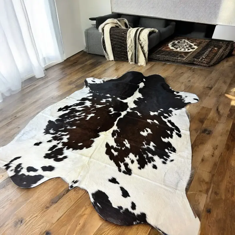 Brown and White Cowhide Peltry Rug