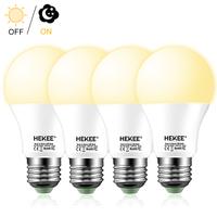 HEKEE Dusk to Dawn Sensor Light Bulbs LED A19 810 Lumens, Outdoor Porch Lights, 60 Watt Equivalent, Warm White 2700K Soft Whi...