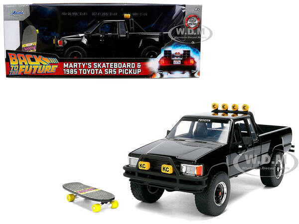 1985 Toyota SR5 Pickup Truck Black with Marty's Skateboard Back to the Future (1985) Movie Hollywood Rides Series 1/24 Di...