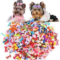 100PCS Cute Puppy Dog Small Bowknot Hair Bows,Yorkie Doggie Bows with Rubber Band Pet Grooming Bows Dog Hair Costume Accessor...