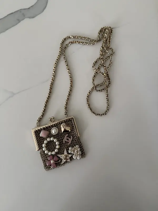 Pre-owned CHANEL metal mini bags Gold Chain Embellished Mini Frame Pouch 22A