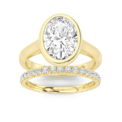 Secret Kiss Lab Grown Oval Shaped Diamond Engagement Ring with the Envoi Wedding Band | 14K Yellow Gold 3 1/2 ct. tw.