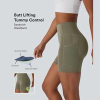 Halara SpeedWave SoCinched High Waisted Tummy Control Butt Lifting Side Pocket Contrast Mesh Quick Dry Workout Biker Shorts 5...
