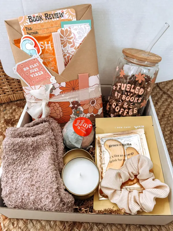 Blind Date with a Book Box— includes a book of your choice of genre, cozy socks, a candle, and other fun book goodies!