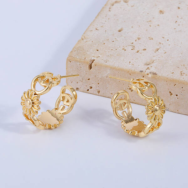 C-shaped Hollow Sunflower Brass Stud Earrings