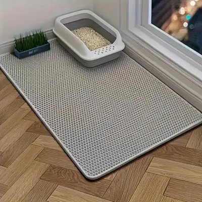 The oversized double-layer splash proof cat litter mat is waterproof, non slip, odor proof, easy to clean and store, making i...