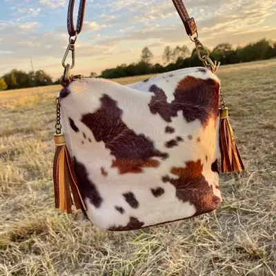 Bucket Cow Print Crossbody Bag