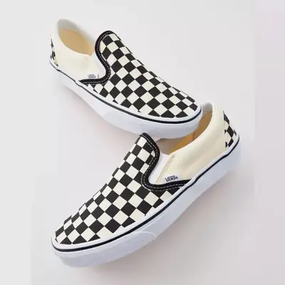Vans Classic Slip-On Checkerboard Shoes.