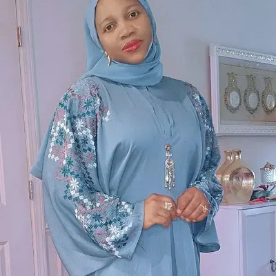 Teal Embroidered Kaftan with Floral Sleeves and Elegant Design