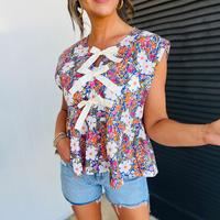 Green Floral Print Bow Applique Slit Sleeveless Peplum Blouse