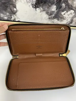 Pre-owned Louis Vuitton canvas and leather Small Leather Goods Travel Zippy Organizer Wallet