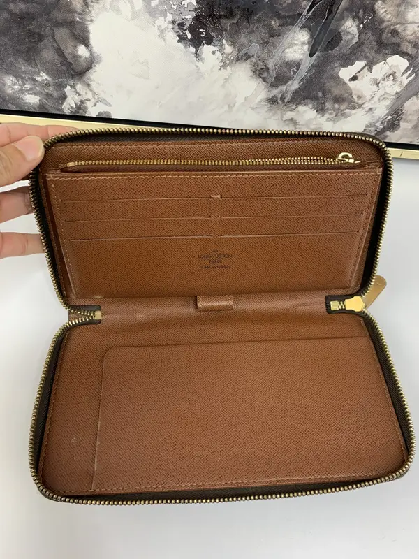 Pre-owned Louis Vuitton canvas and leather Small Leather Goods Travel Zippy Organizer Wallet