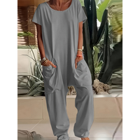 A Women'S Loose-Fitting Romper with Pockets in a Single Color.