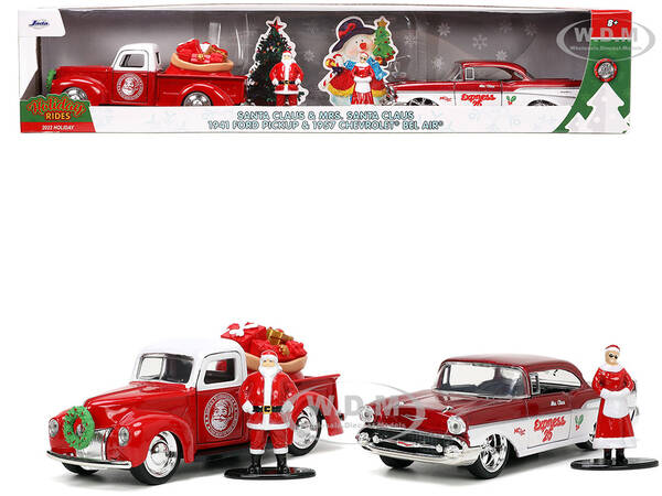 1941 Ford Pickup Truck Red and White Santas Workshop and 1957 Chevrolet Bel Air Red Metallic and White Express 25 with Mr. an...