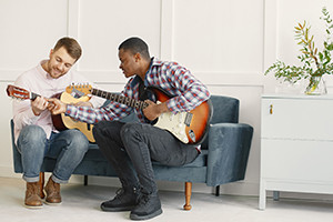 Guitar Rhythm Mastery: Strumming and Percussive Techniques