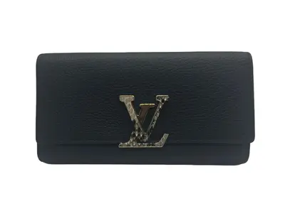 Pre-owned Louis Vuitton Taurillon Leather small leather goods Capucines Wallet in Black Taurillon Leather