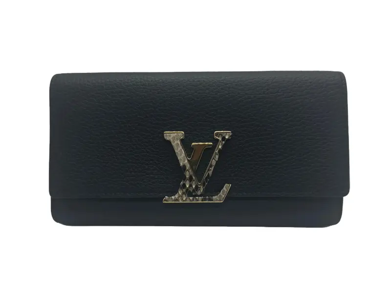 Pre-owned Louis Vuitton Taurillon Leather small leather goods Capucines Wallet in Black Taurillon Leather