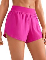CRZ YOGA Mid Waisted Dolphin Athletic Shorts for Women Lightweight High Split Gym Workout Shorts with Liner Quick Dry