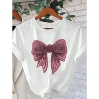 Glamorous and Chic T - Shirt: Stunning Embellished Bow Graphic for a Touch of Elegance