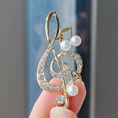 Alloy and Glass Rhinestone Musical Note Brooch