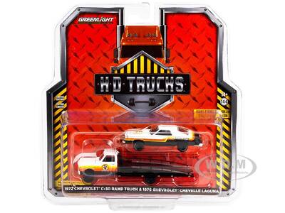 1972 Chevrolet C-30 Ramp Truck with 1976 Chevrolet Chevelle Laguna Black and White with Stripes \