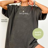Comfort Colors He's Golfing Shirt, Golfing Season Shirt, Golfer Wife Shirt, Golfing Mom Shirt, Golf Player Shirt for Mom, Gol...