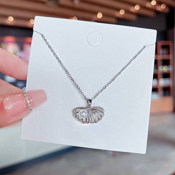Rhinestone and Plastic Pearl Pendant Necklaces