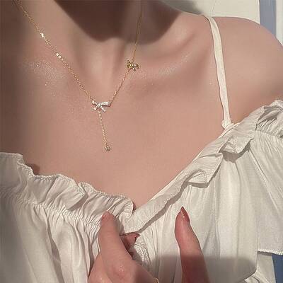 Brass Micro Pave Clear Cubic Zirconia Bowknot Pendant Necklaces