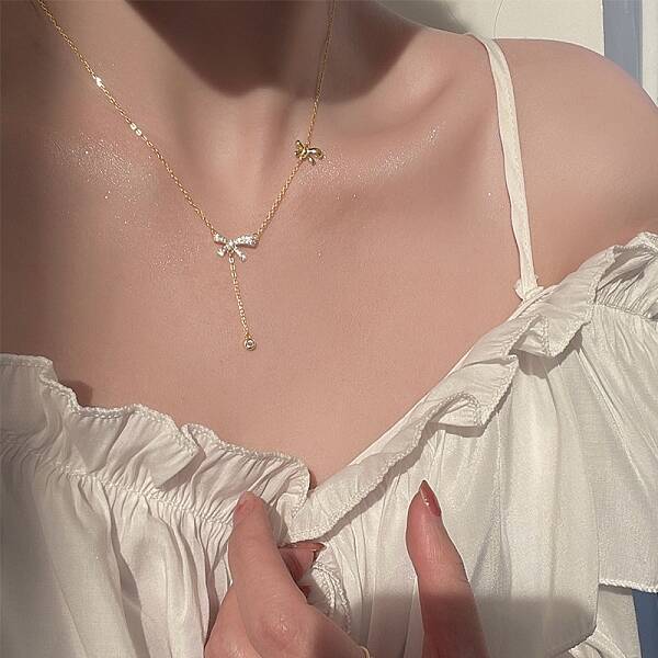 Brass Micro Pave Clear Cubic Zirconia Bowknot Pendant Necklaces