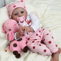 WOOROY  Reborn Doll - Birthday & Christmas Gift for Kids, 22 In Lifelike Realistic Newborn Soft Vinyl Limbs with Cloth Baby D...