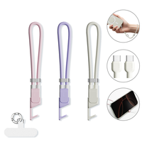 WHEAXY 3-in-1 Anti Theft Silicone Cable Phone Lanyard, Phone Stand, Adjustable Wrist Strap, 65W Fast Charging Cable, Multifun...