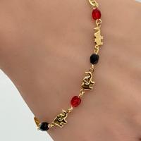 14k Gold Plated Elephant Bracelet with Black and Red Beads, Featuring Elephant Charm and Gold-Tied Design