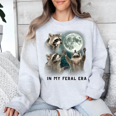 (Original Viral Product) Feral Era Racoon Crew Neck Sweatshirt or Short Sleeve Graphic T-shirt Crew Neck Crew Neck Crewneck M...