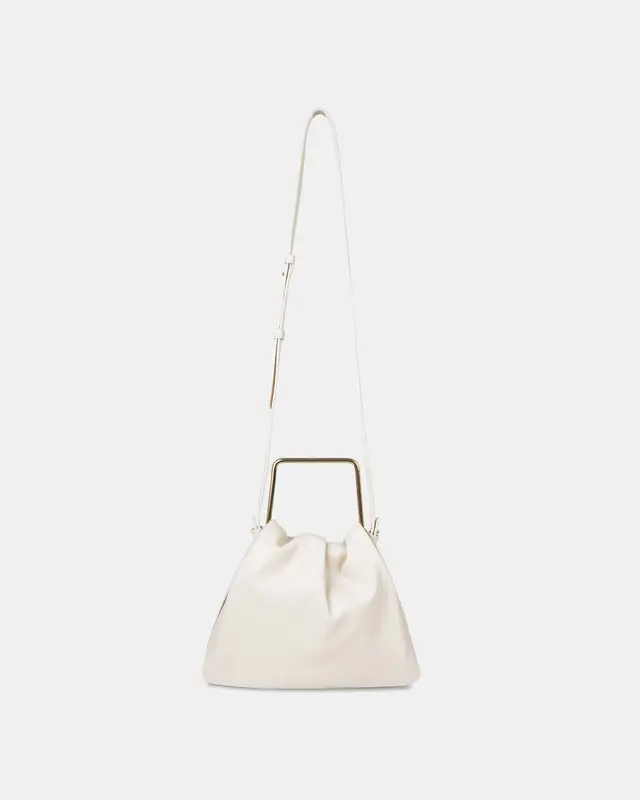 ?? Poppy Corn Leather Bag | Color: Sand