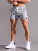 Men's Basic Regular Fit Solid Pocket Drawstring Shorts, Casual Streetwear Simple Patched Detail Elastic Waist Shorts for Summ...