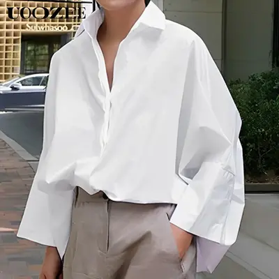 UOOZEE women's long-sleeved loose solid color lapel shirt tops for all seasons loose and simple Polyester oversized versatile...