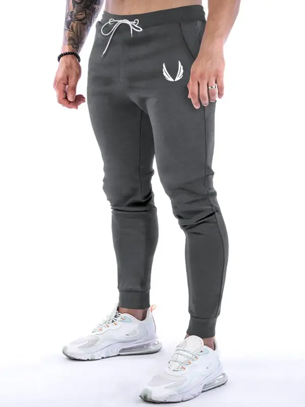 Men's Regular Fit Wings Graphic Carrot Pants with Pocket Design, Casual Drawstring Waist Pants, Men Soft Comfy Trousers For F...