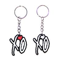 XO Singer Keychain - Artist Keychain Perfect for Keys, Bags, or Collectors