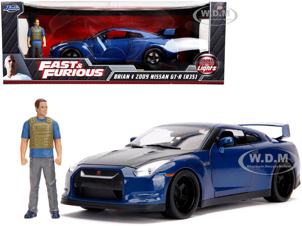 2009 Nissan GT-R (R35) Blue Metallic and Carbon with Lights and Brian Figurine Fast & Furious Movie 1/18 Diecast Model Car by...