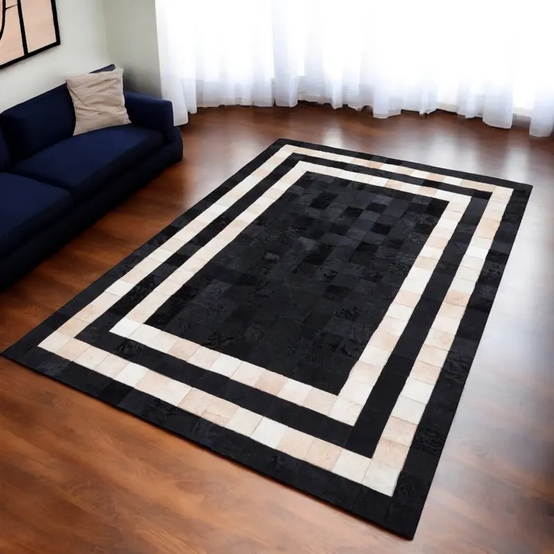 Cream Cowhide Patchwork Rug with Black Frame