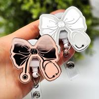Bow with Stethoscope Badge Reel, Laser Engraved with Smooth Mirror Finish, Funny Badge reel for nurses, xray techs and hospit...