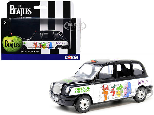 The Beatles London Taxi RHD (Right Hand Drive) Ob-La-Di, Ob-La-Da Black and White with Graphics Diecast Model Car by Corgi