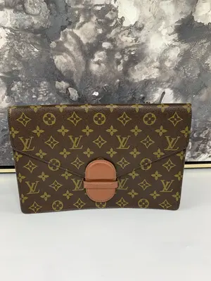 Pre-owned canvas clutches & wristlets Vintage Monogram Clutch