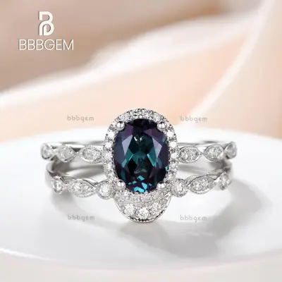 Oval Alexandrite Halo Diamond Engagement Ring Set With Curved Diamond Band