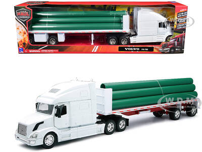 Volvo VN-780 Truck with Flatbed Trailer and Long Pipes White \